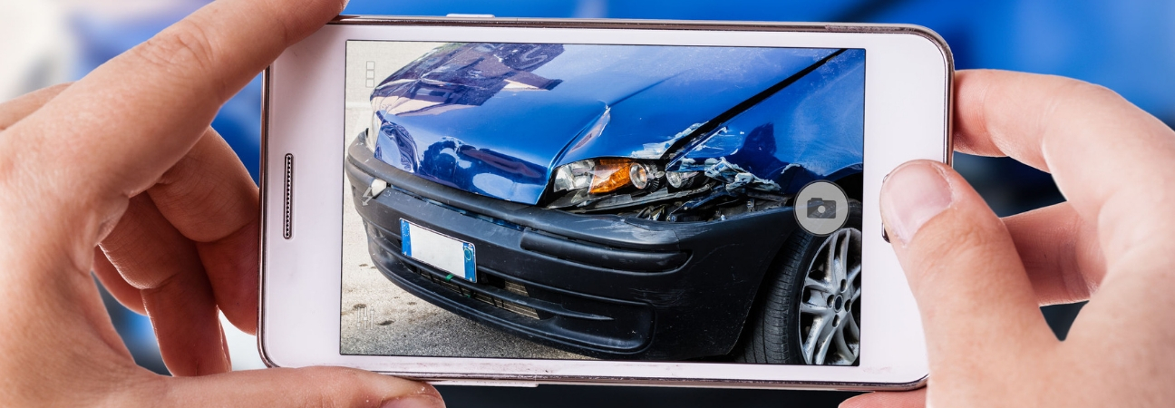 Phone taking picture of car after accident